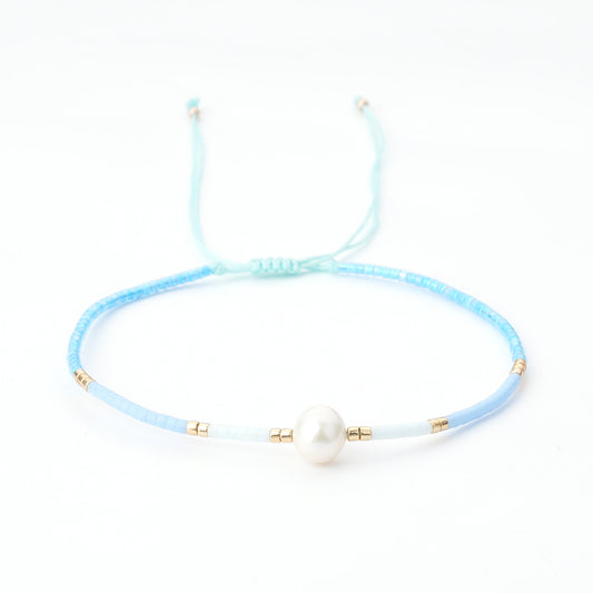Pulsera hilo perla