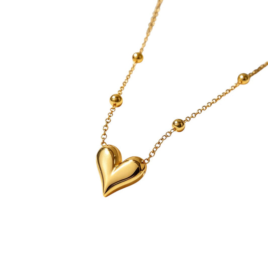 Collar corazón bolitas 💛