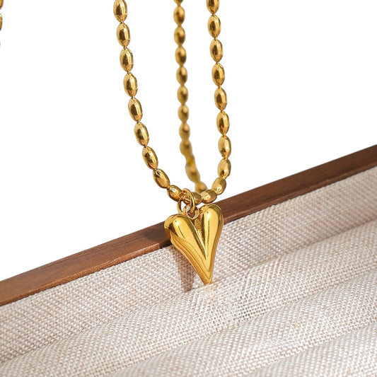 Collar corazón bolitas