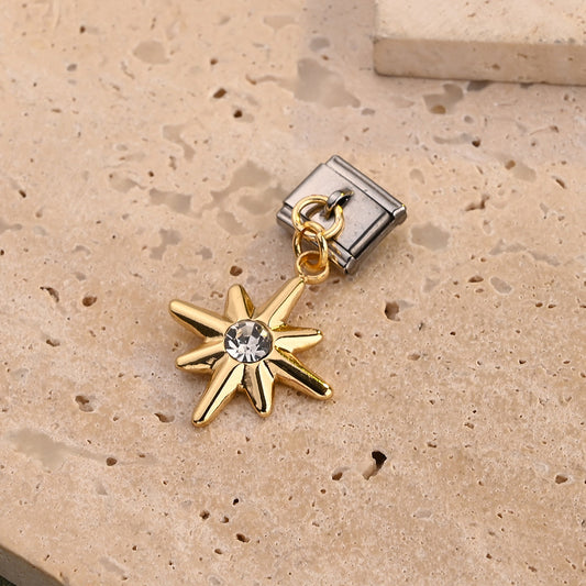 Charm estrella dorado