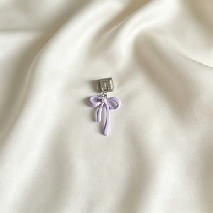 Charm moño
