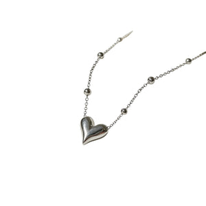 Collar corazón bolitas 💛
