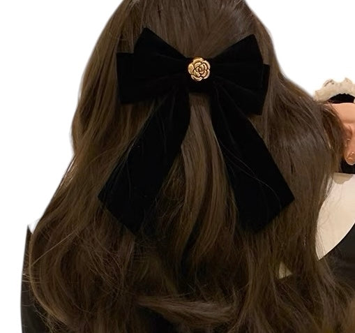 Moño negro flor