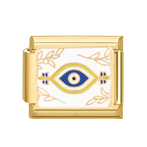 Charm dorado ojo