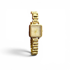 Reloj flor dorada
