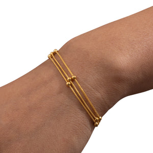 Pulsera triple bolitas